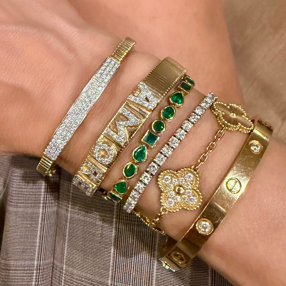 14KT Gold Multi Shaped Emerald Tennis Bracelet