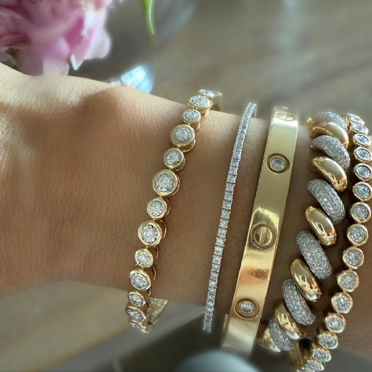 14KT Gold Diamond The Line Alternating Size Bezel Set Bangle