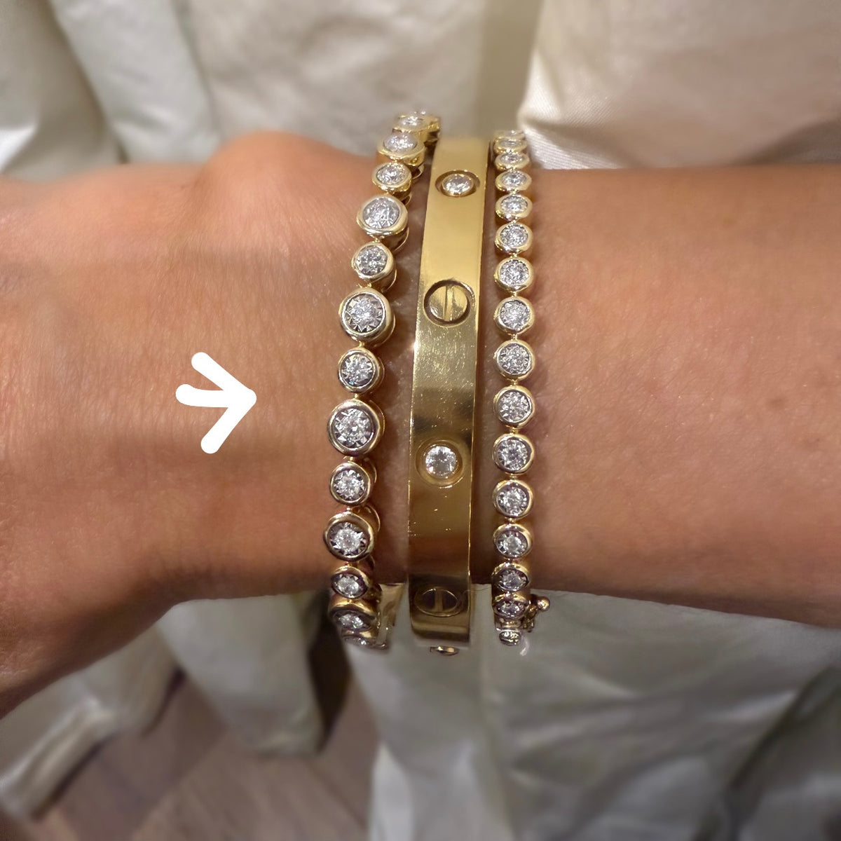 14KT Gold Diamond The Line Alternating Size Bezel Set Bangle