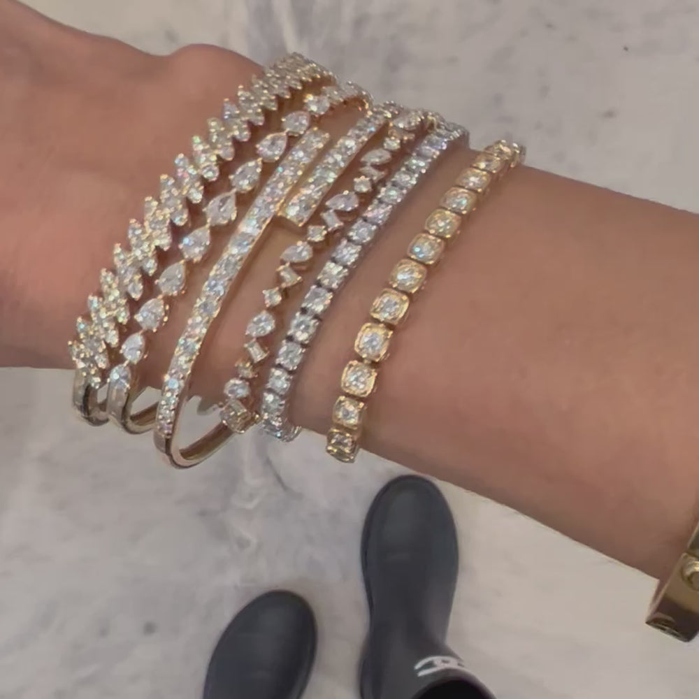 
                
                    Load and play video in Gallery viewer, 14KT Gold Pear Cut Diamond Luxe Mya Bangle Bracelet
                
            